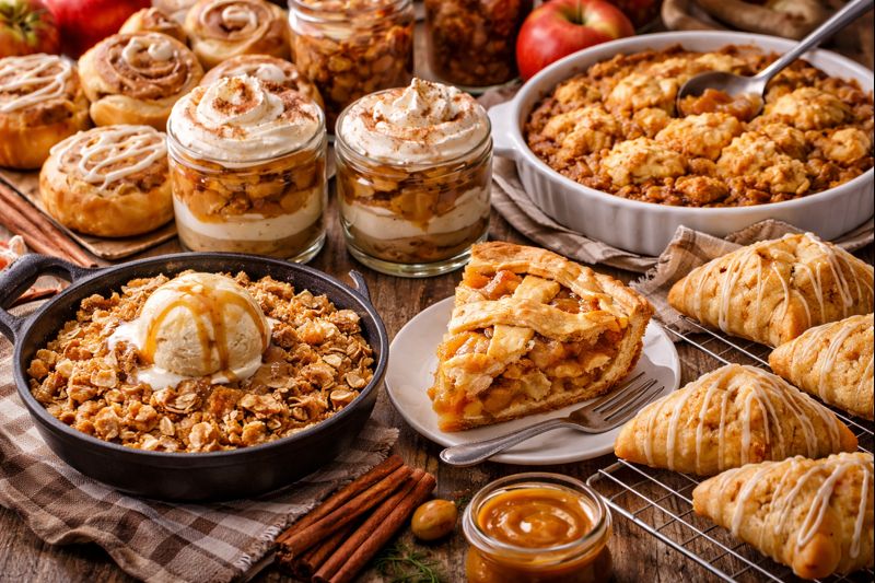Various desserts made with apple pie filling including cobbler, pie, parfaits, and pastries